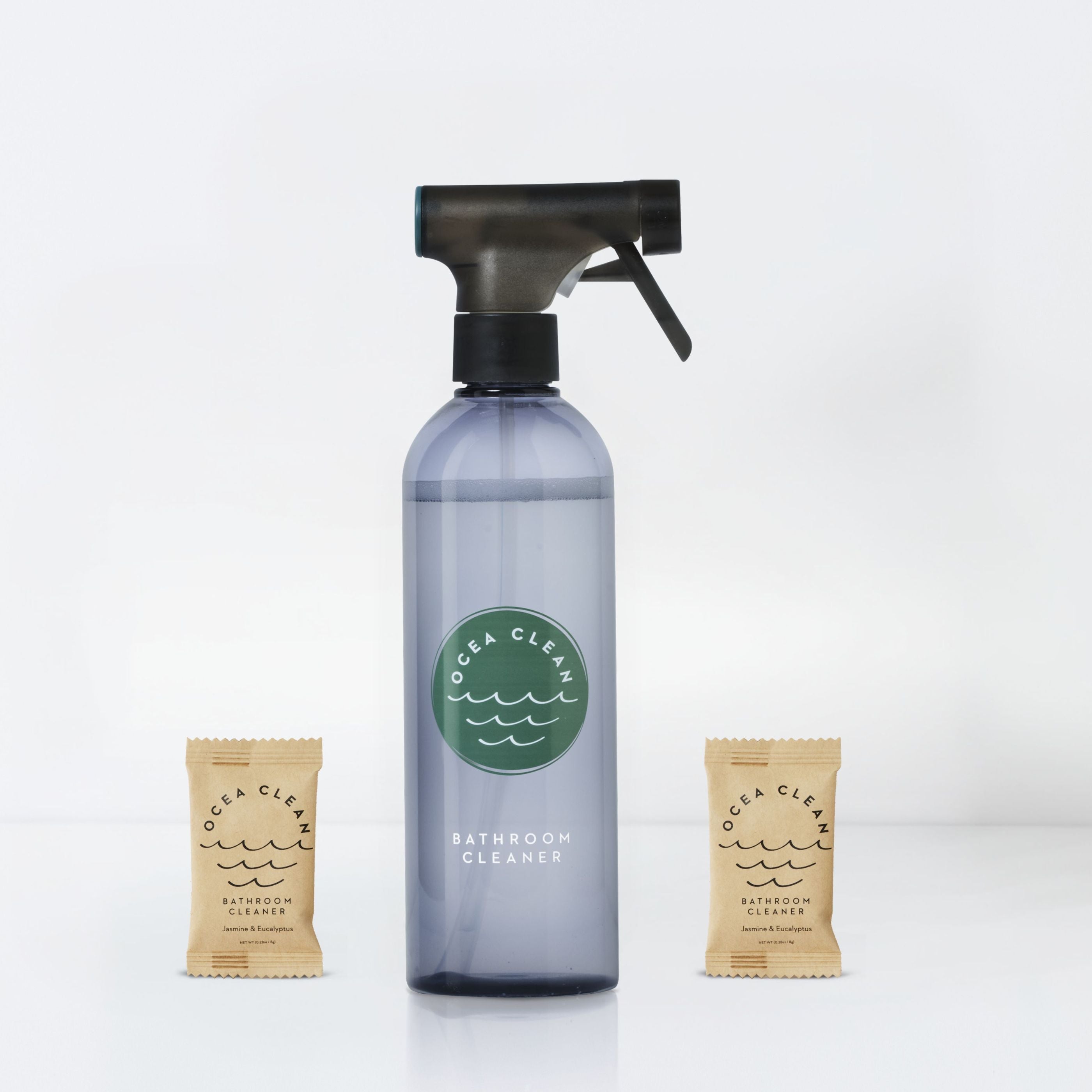 Bathroom cleaner bottle with two tablets on a white background