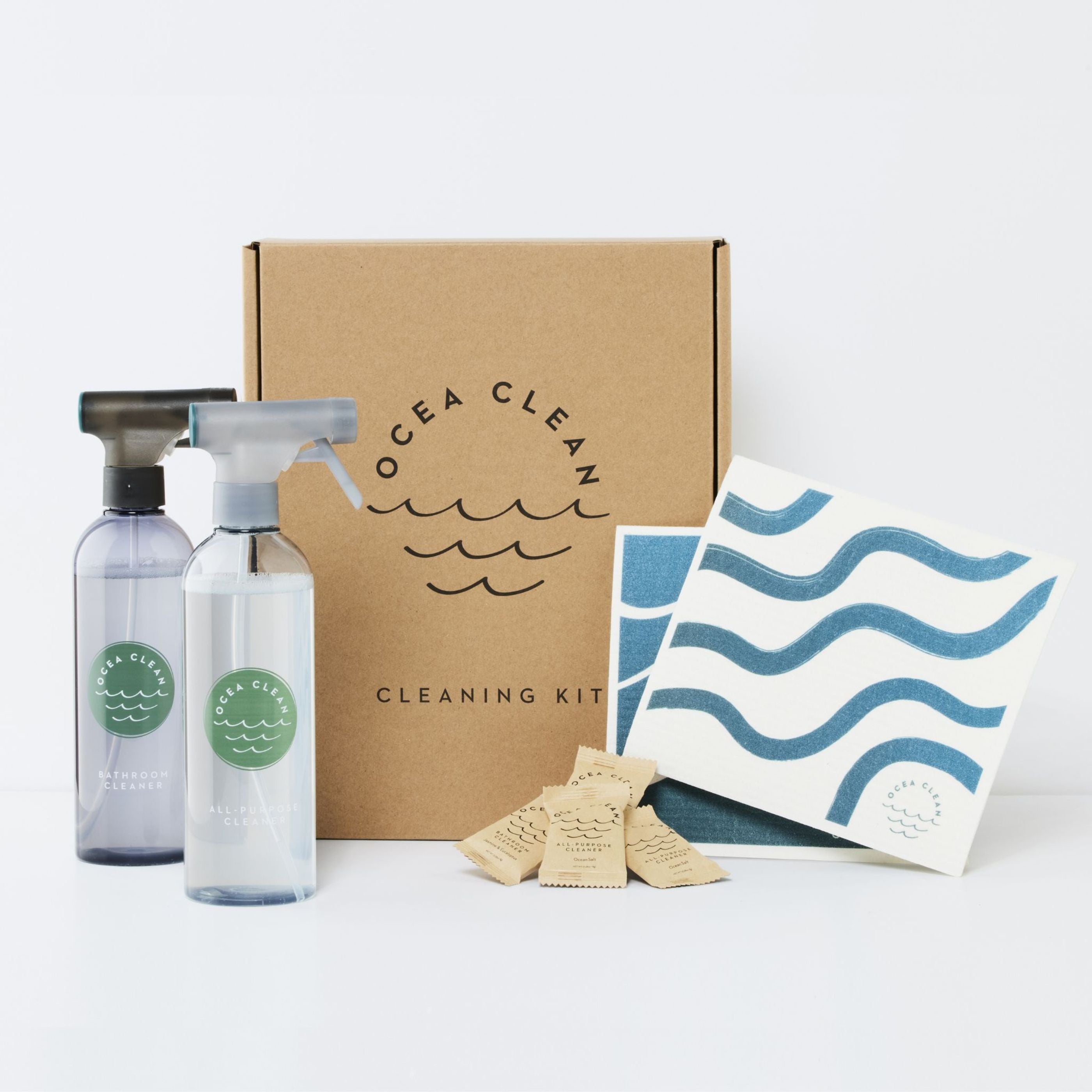 Ocea Clean cleaning kit with bottles, box, and cleaning tools on a white background