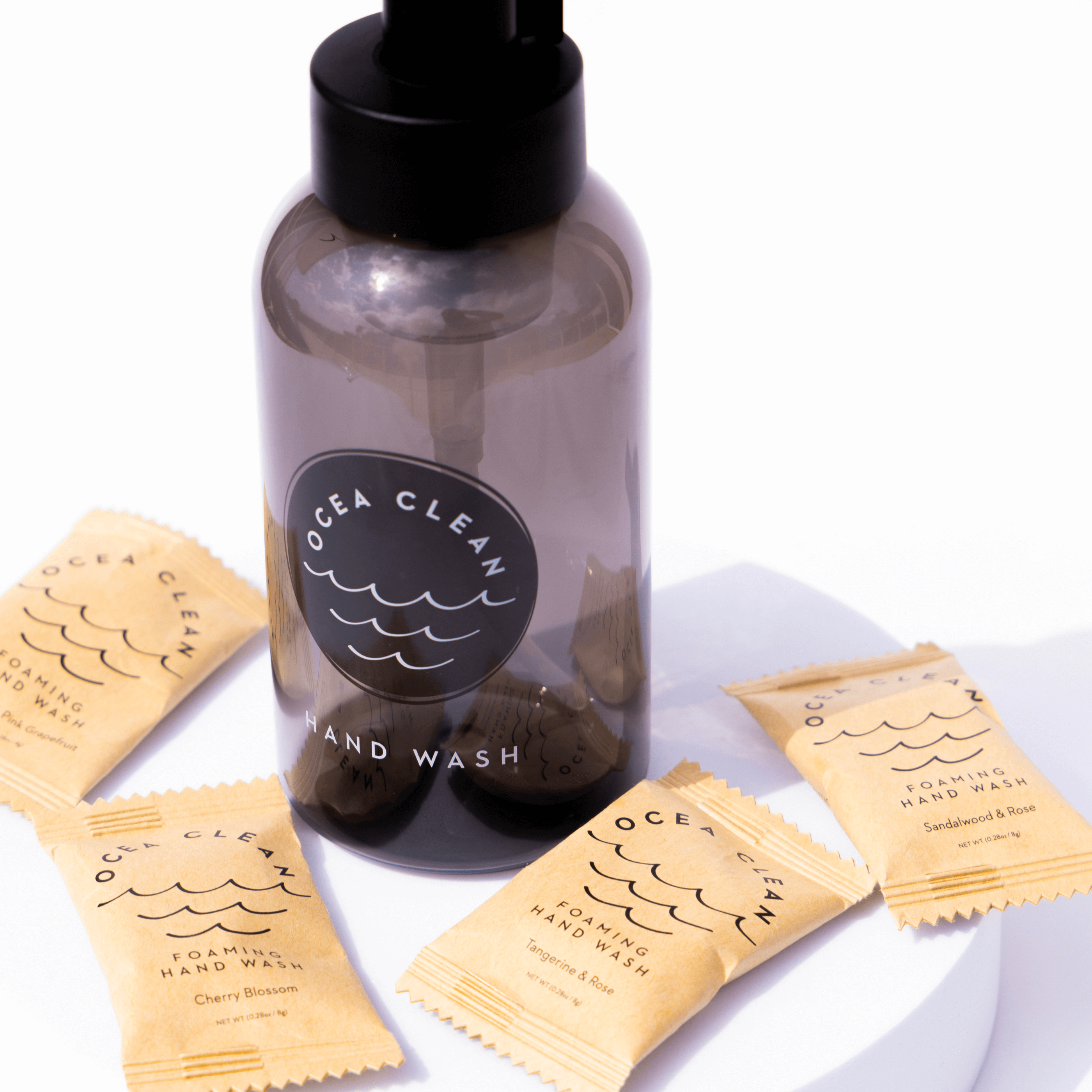 Ocea Clean Single Hand Wash Pack with reusable foaming dispenser and hand wash tablets in Cherry Blossom and Sandalwood & Rose.