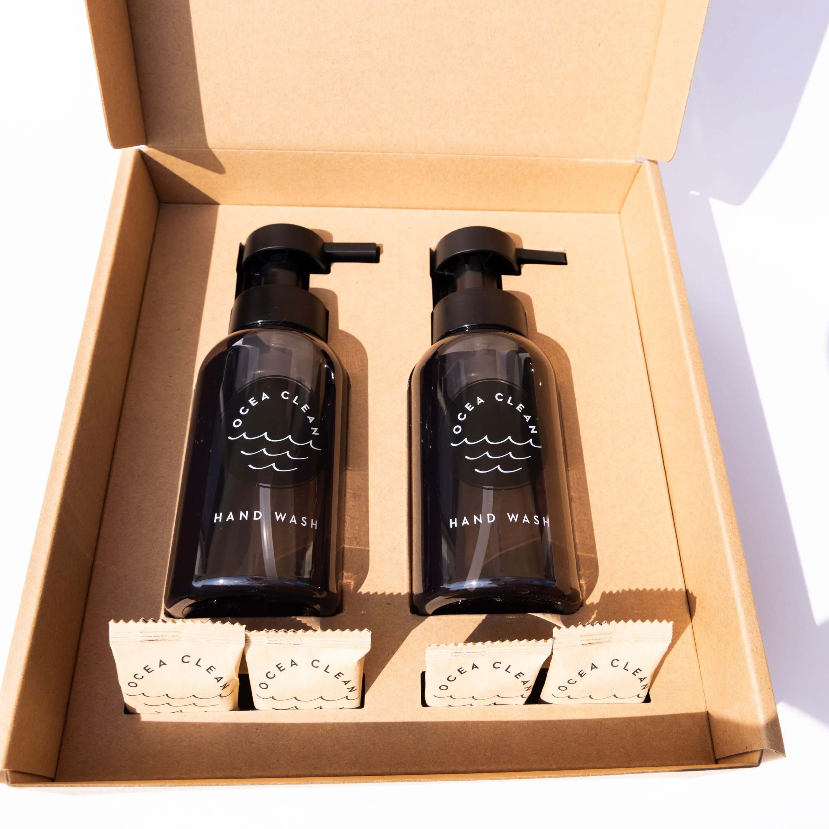Ocea Clean Hand Wash Pack featuring two reusable foaming dispensers and dissolvable cleaning tablets in a box.