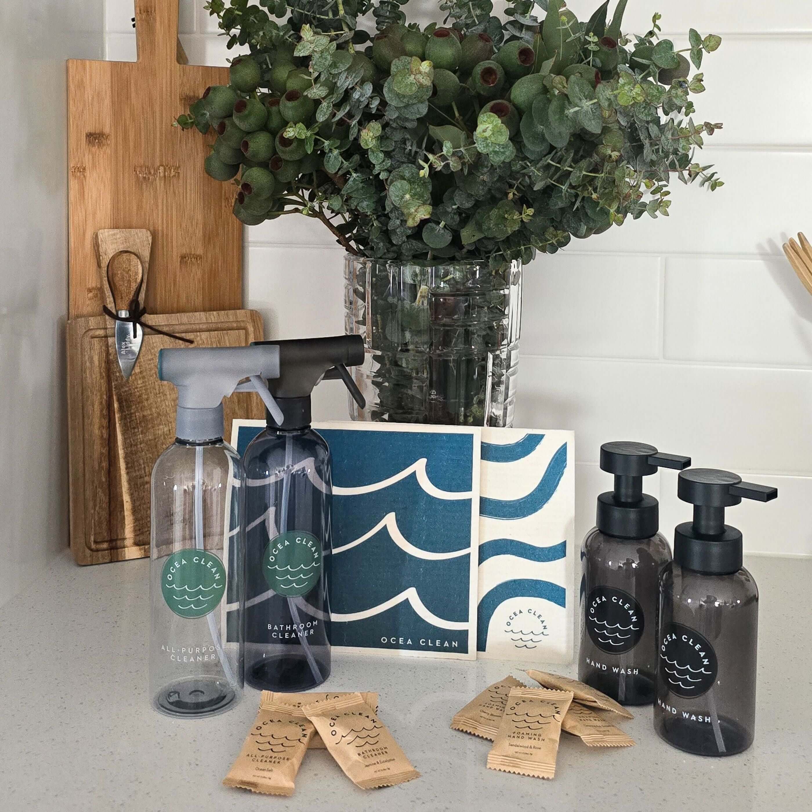 Complete Home Reset Bundle featuring refillable cleaning products, eco-friendly bottles, and dissolvable cleaning tablets.