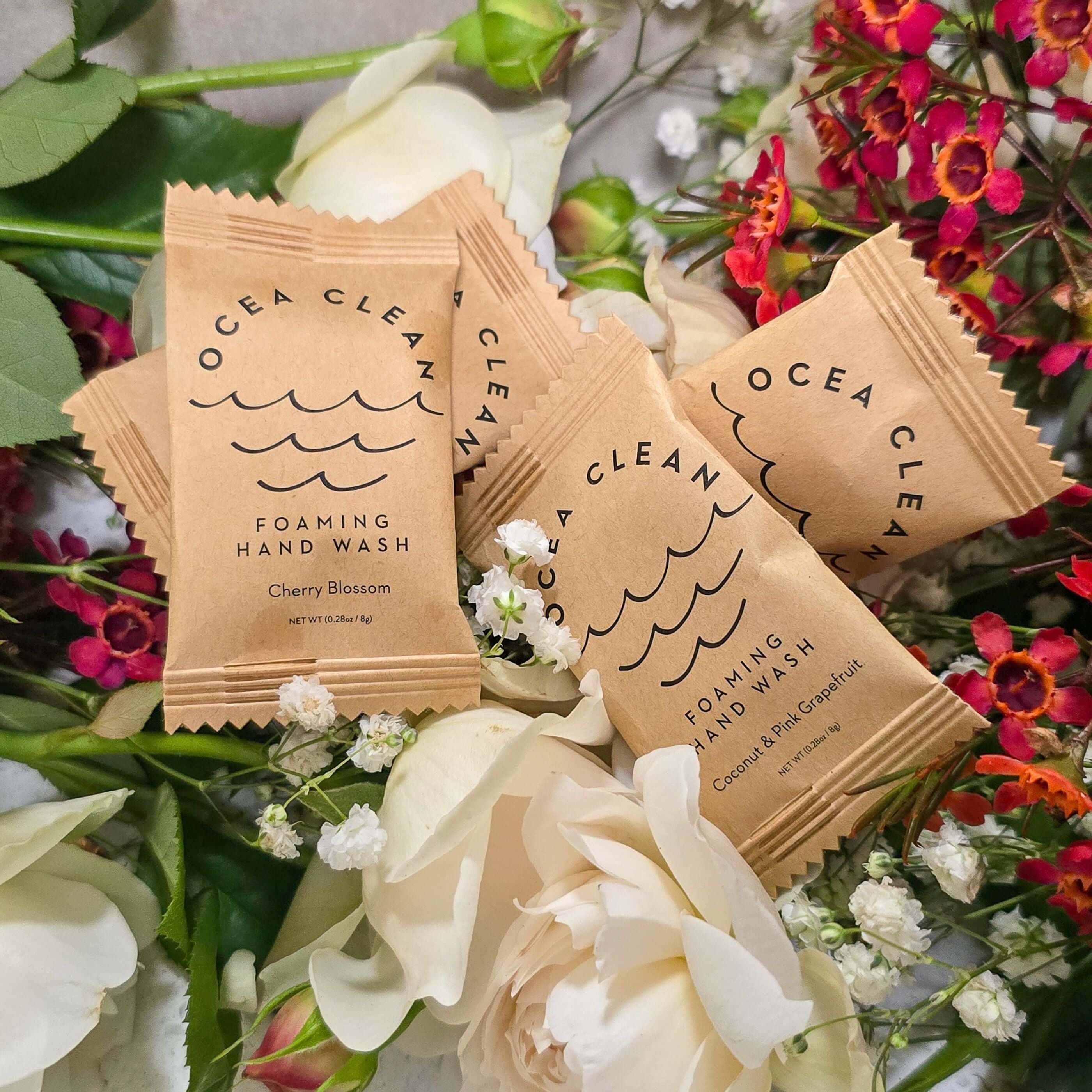 Ocea Clean Single Hand Wash Pack with Cherry Blossom and floral background, showcasing refillable cleaning products.