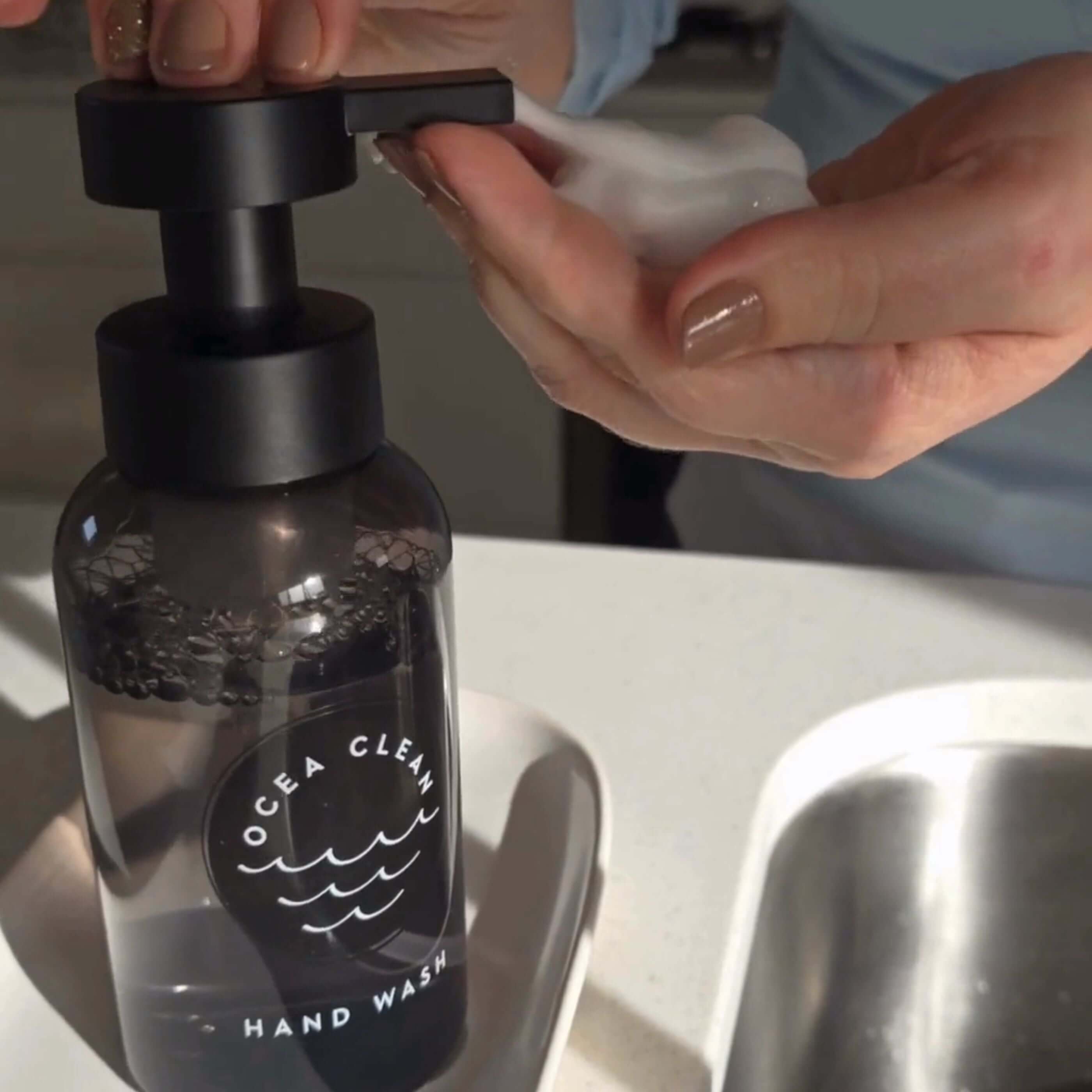 Ocea Clean Hand Wash Pack dispenser foaming hand wash with soft foam, promoting eco-friendly and plant-based cleaning.